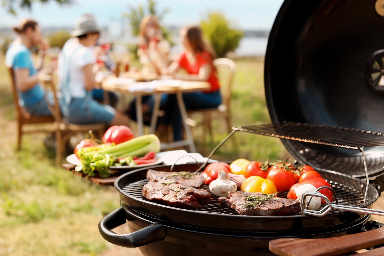 Modern grill with meat and vegetables outdoors, closeup Kuchnia i altana grillowa